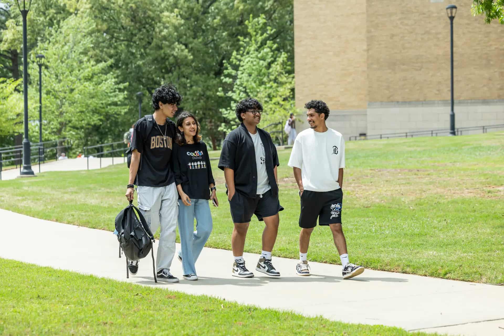 Arkansas State University students walking on campus