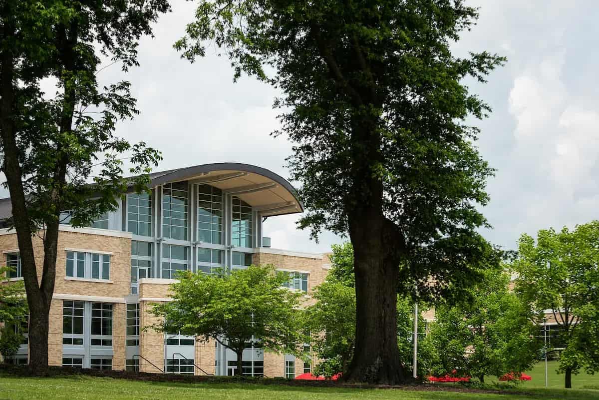A-State campus building behind trees